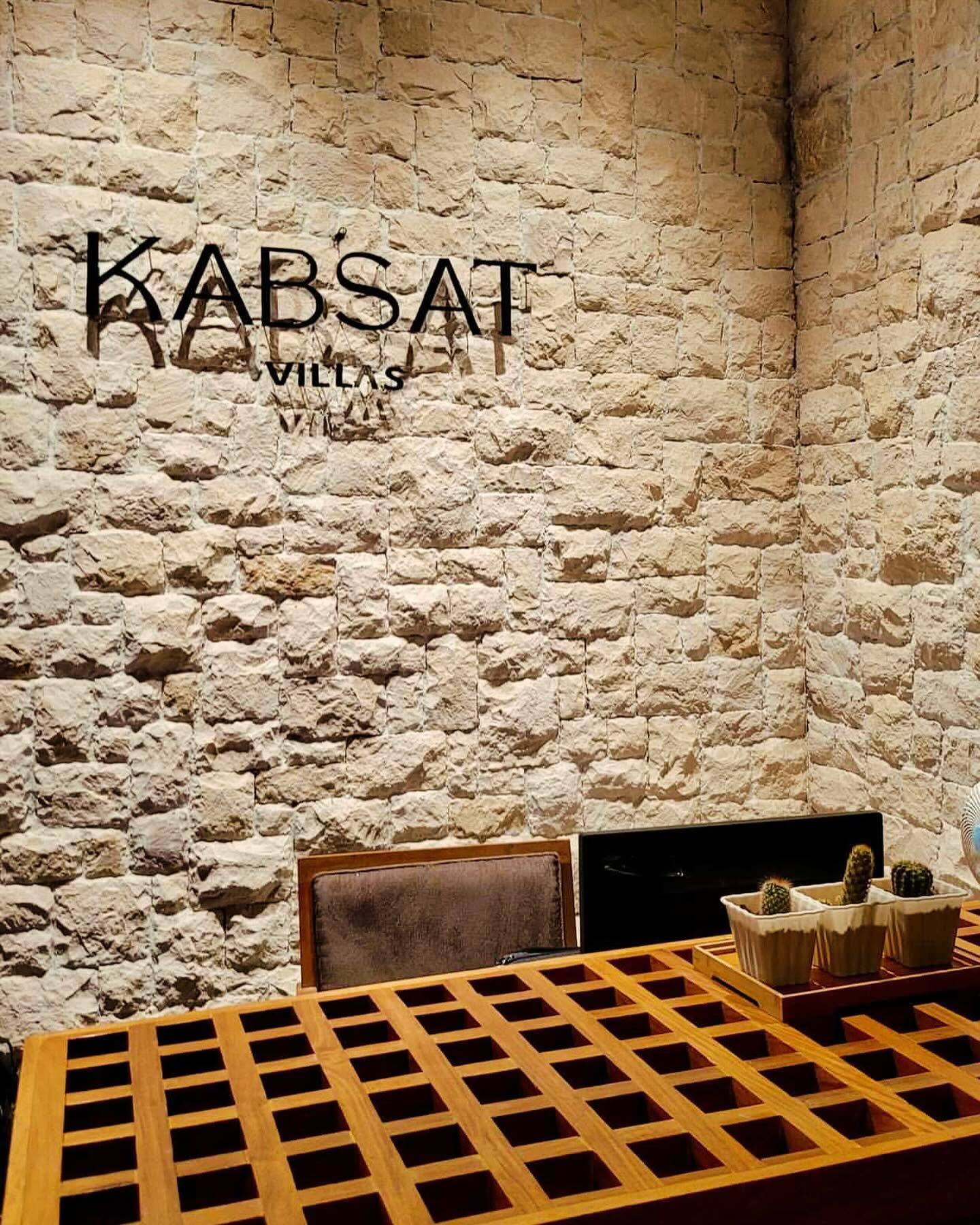 Kabsat Villas stone wall logo sign